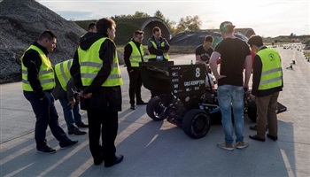 Infinity Racing team with their self-driving prototype. Infinity Racing team with their self-driving prototype.