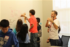 TI engineer Robert Glazewski mentors students as they envision the classroom of the future