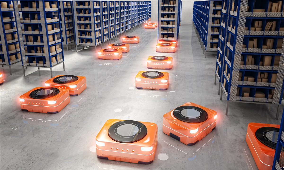 An illustration of industrial mobile robots using machine vision to automate warehouse organization