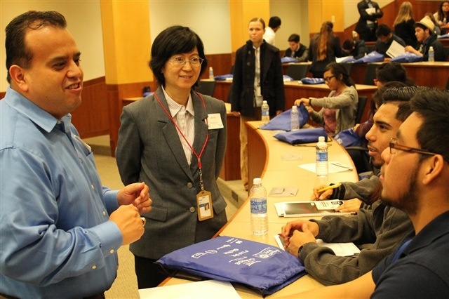 Ruben Reyna (left) and Jane Xin (right) talk to students about advice for the future at UTD.
